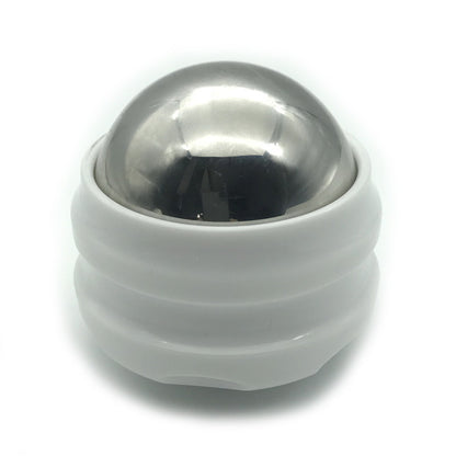 Silver metal massage ball with white rubber base designed for muscle pain relief and stress reduction.