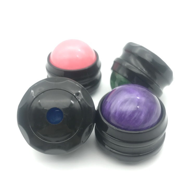 Set of colorful massage relaxation fitness balls in various colors like blue, purple, pink, and green.